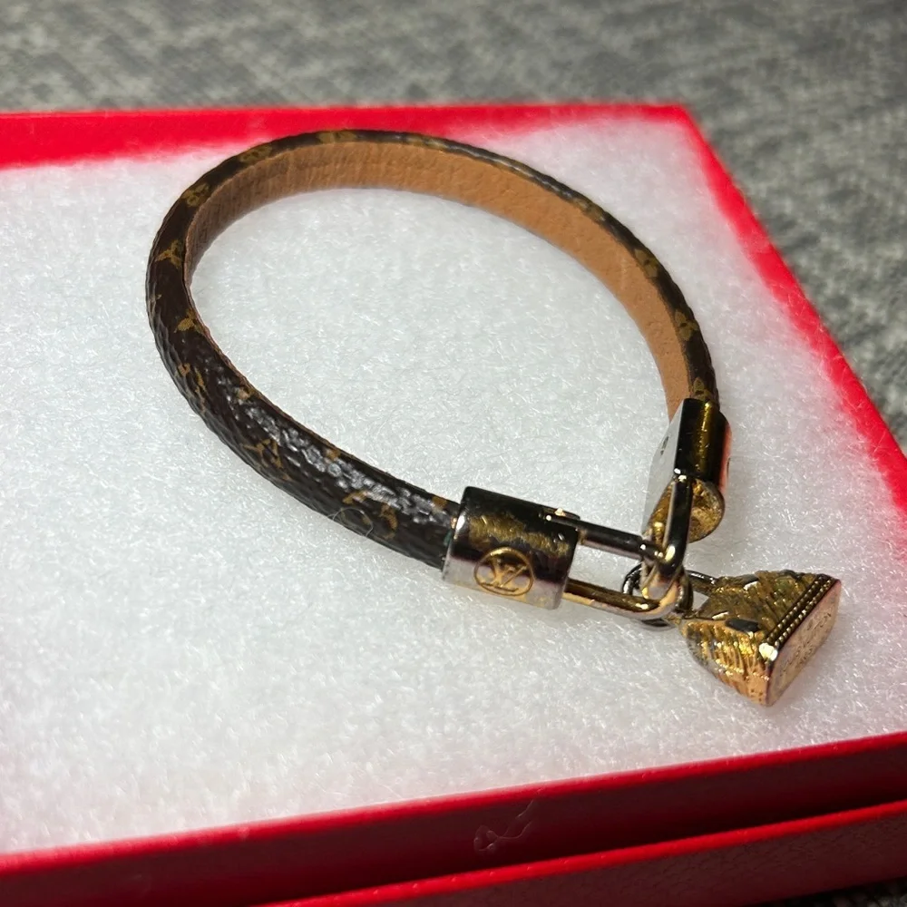 267. Louis Vuitton Monogram Alma Charm Bracelet with COA